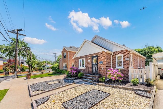 view of front of home with brick siding