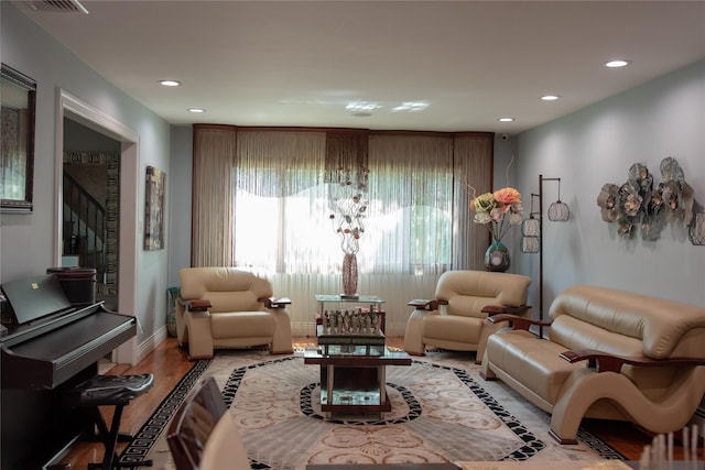 1010 S End, Woodmere, NY 11598 - living room with recessed lighting, light wood-style flooring, stairs, and baseboards