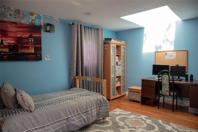 1010 S End, Woodmere, NY 11598 - bedroom featuring wood finished floors and a desk
