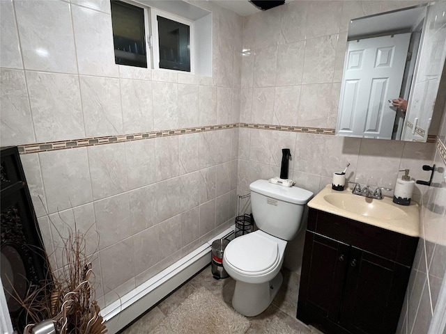 1010 S End, Woodmere, NY 11598 - bathroom with tile walls, toilet, vanity, and backsplash