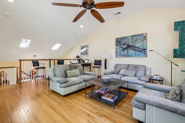 1 Meadowood Path, New Rochelle, NY 10804 - living area featuring vaulted ceiling, a ceiling fan, wood finished floors, and a skylight