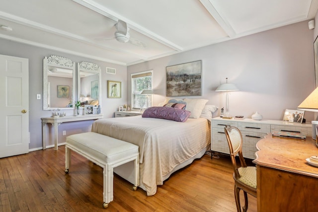 1 Meadowood Path, New Rochelle, NY 10804 - bedroom with light wood-type flooring, beamed ceiling, and a ceiling fan