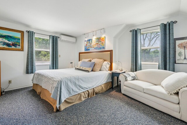 1 Meadowood Path, New Rochelle, NY 10804 - carpeted bedroom with a wall mounted AC and rail lighting
