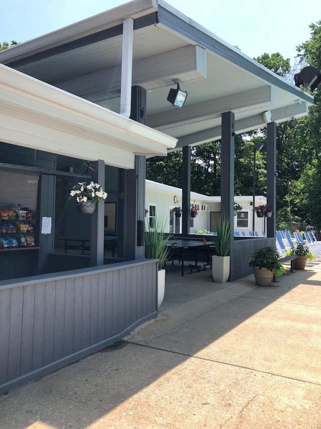 1 Meadowood Path, New Rochelle, NY 10804 - view of patio / terrace featuring a sunroom