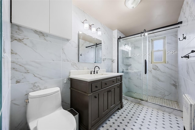 17-12 Starr St, Ridgewood, NY 11385 - bathroom featuring tile walls, vanity, a marble finish shower, toilet, and tile patterned floors
