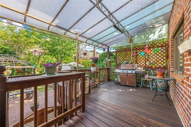 17-12 Starr St, Ridgewood, NY 11385 - wooden terrace featuring a pergola and grilling area