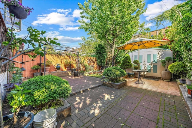 17-12 Starr St, Ridgewood, NY 11385 - fenced backyard with a patio