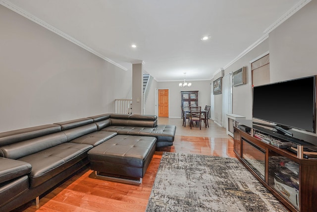 70-27 69th St, Glendale, NY 11385 - living room featuring a chandelier, crown molding, light wood-type flooring, recessed lighting, and baseboards