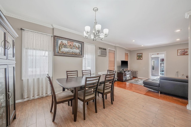 70-27 69th St, Glendale, NY 11385 - dining space with a chandelier, a wall mounted air conditioner, recessed lighting, light wood-style flooring, and ornamental molding
