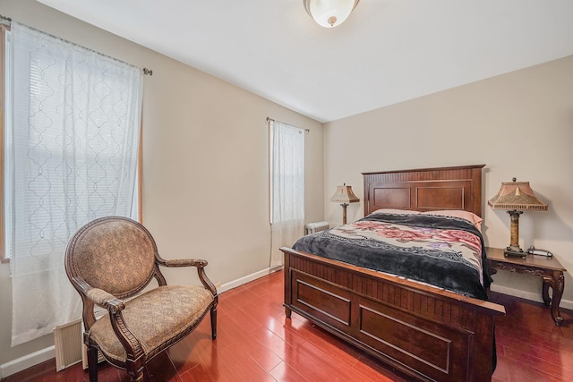 70-27 69th St, Glendale, NY 11385 - bedroom featuring wood finished floors and baseboards