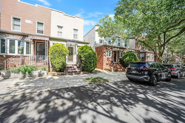 70-27 69th St, Glendale, NY 11385 - view of property with brick siding