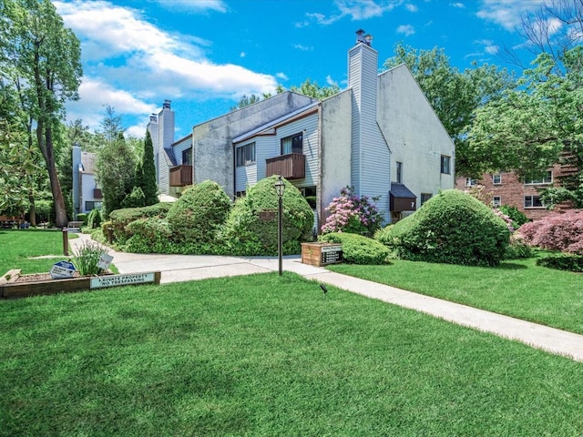 10 Wooleys Ln Unit 1F, Great Neck, NY 11023 - view of home's community with a lawn