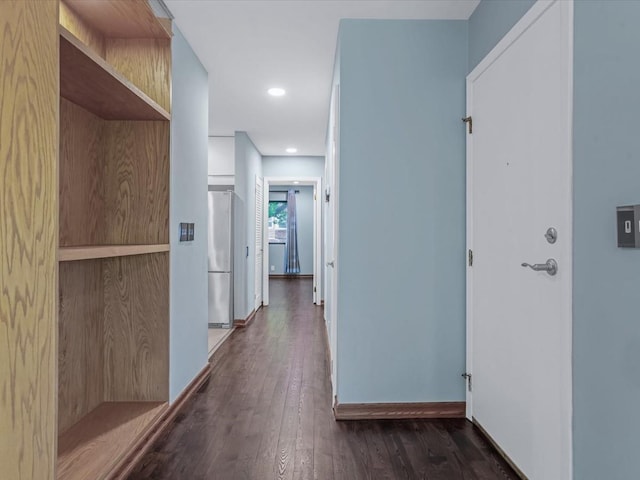 10 Wooleys Ln Unit 1F, Great Neck, NY 11023 - hallway with dark wood-type flooring, recessed lighting, and baseboards