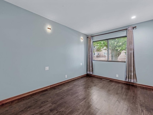 10 Wooleys Ln Unit 1F, Great Neck, NY 11023 - unfurnished room featuring dark wood finished floors, baseboards, and recessed lighting