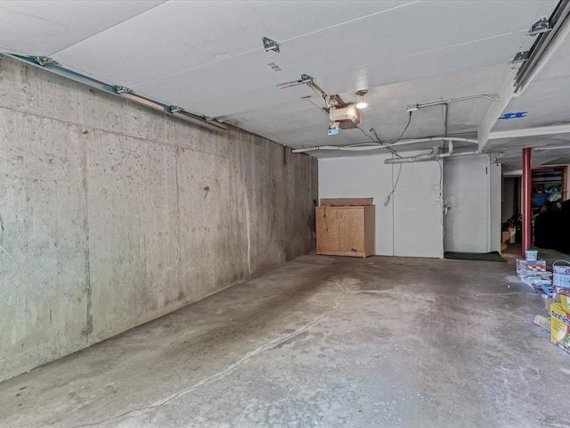 10 Wooleys Ln Unit 1F, Great Neck, NY 11023 - garage with a garage door opener