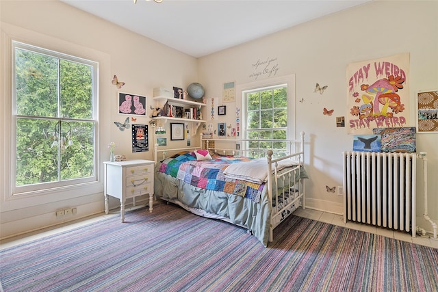 679 Titicus Rd, North Salem, NY 10560 - tiled bedroom featuring radiator and baseboards