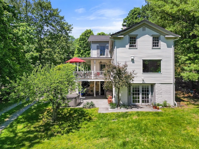 679 Titicus Rd, North Salem, NY 10560 - rear view of property with a patio and a lawn