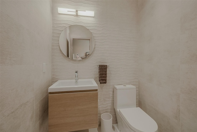 7 Robin Ln, Shelter Island Heights, NY 11964 - half bath with toilet, vanity, and tile walls