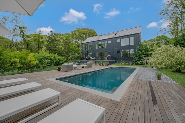 7 Robin Ln, Shelter Island Heights, NY 11964 - swimming pool featuring an outdoor hangout area and a deck