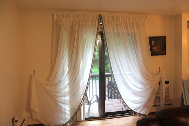 9 Secora Rd Unit K-7, Monsey, NY 10952 - entryway with a baseboard radiator and wood finished floors