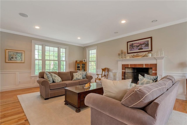 32 Old Chester Rd, Goshen, NY 10924 - living area featuring ornamental molding, light wood finished floors, wainscoting, a decorative wall, and recessed lighting