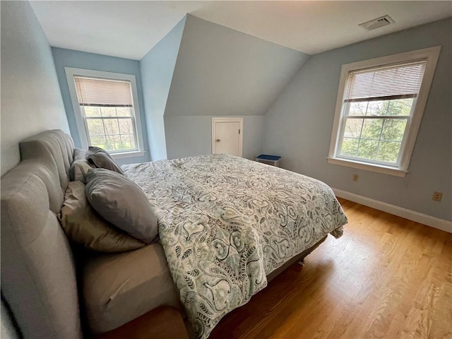 32 Old Chester Rd, Goshen, NY 10924 - bedroom featuring light wood-style floors, baseboards, and lofted ceiling