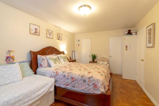 365 Bronx River Rd Unit 2M, Yonkers, NY 10704 - bedroom featuring baseboards