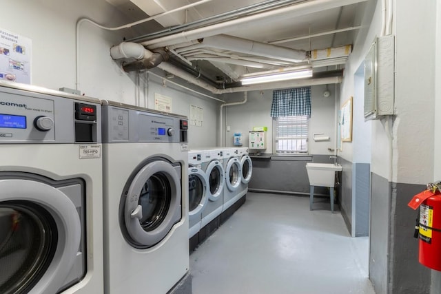 365 Bronx River Rd Unit 2M, Yonkers, NY 10704 - community laundry room with washing machine and dryer