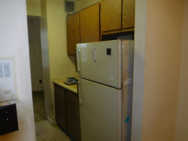 377 N Broadway Unit 601, Yonkers, NY 10701 - kitchen featuring freestanding refrigerator and light countertops