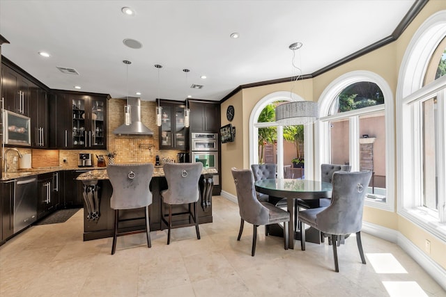 142-30 13th Ave, Malba, NY 11357 - dining room featuring ornamental molding, baseboards, recessed lighting, and light tile patterned floors