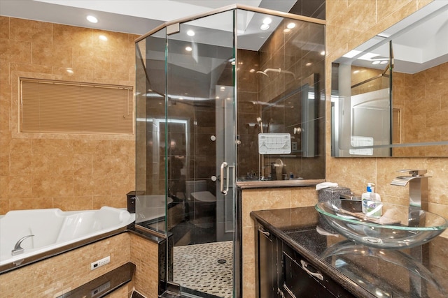 142-30 13th Ave, Malba, NY 11357 - full bathroom featuring tile walls, a garden tub, a shower stall, and vanity