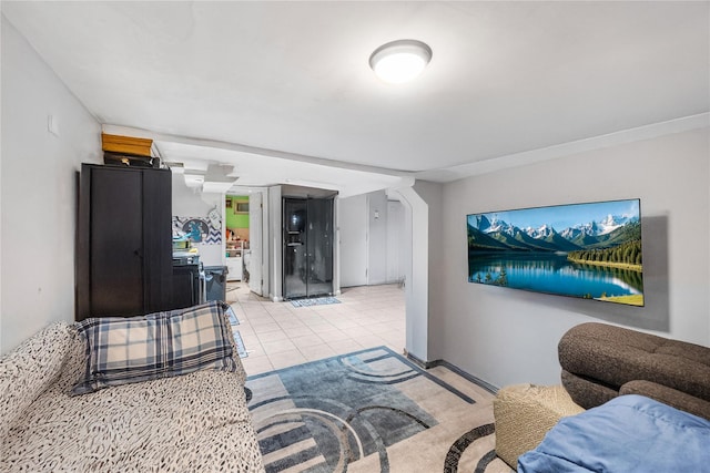 13538 129th St, South Ozone Park, NY 11420 - living room with light tile patterned floors and baseboards