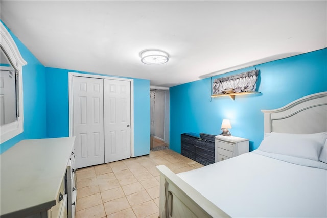 13538 129th St, South Ozone Park, NY 11420 - bedroom featuring a closet and light tile patterned floors