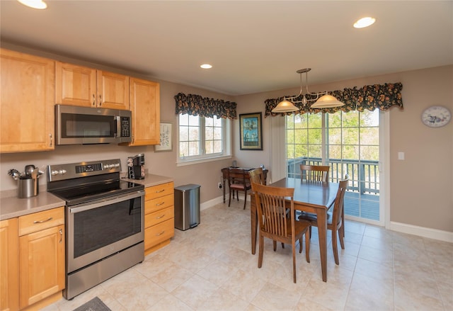 68 Hudson View Ter, Hyde Park, NY 12538 - kitchen featuring stainless steel appliances, light brown cabinetry, baseboards, recessed lighting, and light countertops