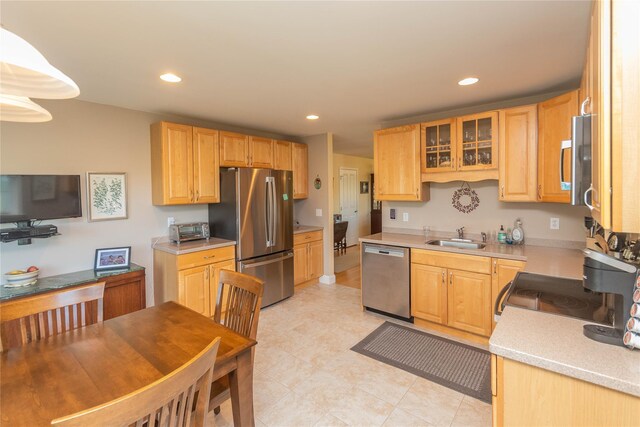 68 Hudson View Ter, Hyde Park, NY 12538 - kitchen with appliances with stainless steel finishes, a sink, light countertops, recessed lighting, and glass insert cabinets