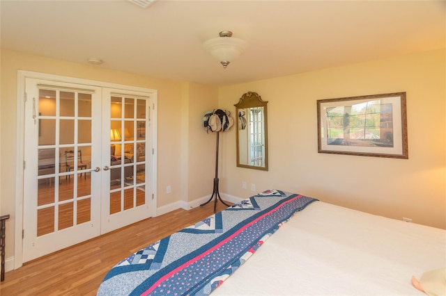 68 Hudson View Ter, Hyde Park, NY 12538 - bedroom featuring french doors, wood finished floors, and baseboards