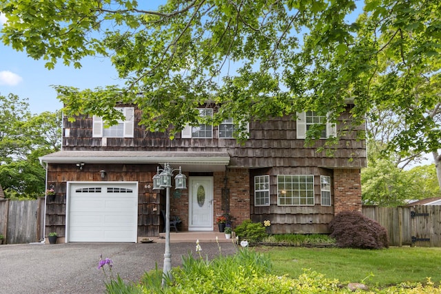 60 Heston Rd, Shirley, NY 11967 - view of front of house featuring an attached garage