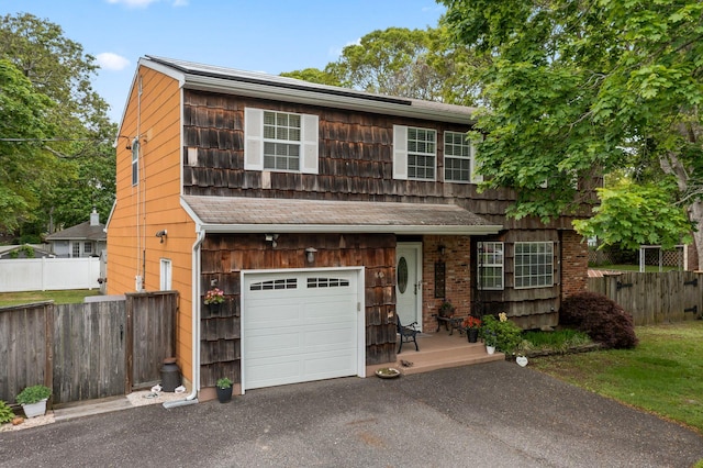 60 Heston Rd, Shirley, NY 11967 - view of front of property with an attached garage and driveway
