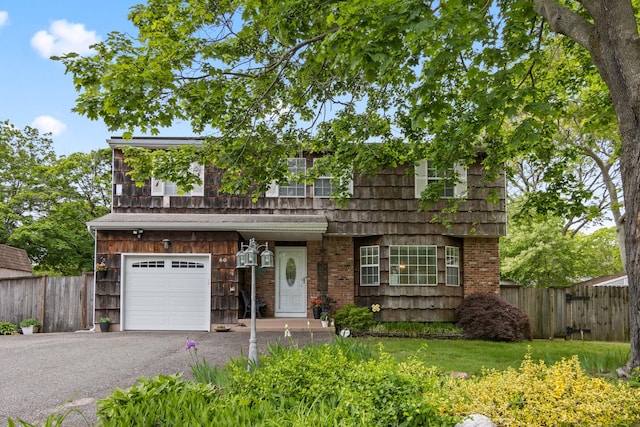60 Heston Rd, Shirley, NY 11967 - view of front of property with a garage and asphalt driveway