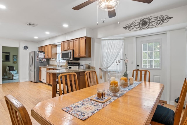 60 Heston Rd, Shirley, NY 11967 - dining area with a ceiling fan, recessed lighting, light wood finished floors, and baseboards