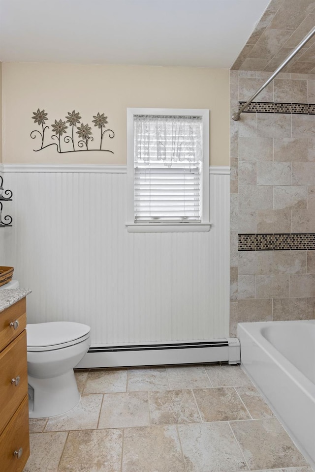 60 Heston Rd, Shirley, NY 11967 - bathroom featuring vanity, a wainscoted wall, a baseboard radiator, toilet, and shower / tub combination