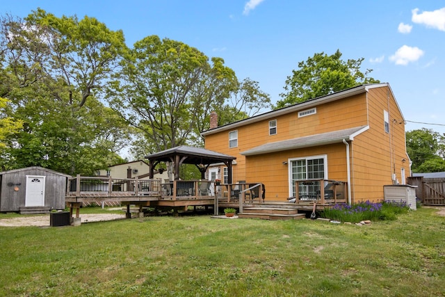 60 Heston Rd, Shirley, NY 11967 - back of house with a gazebo, a deck, and a chimney