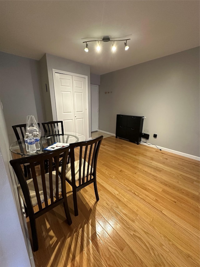 87-30 62nd Ave Unit 5-E, Rego Park, NY 11374 - dining space with light wood-style floors and baseboards