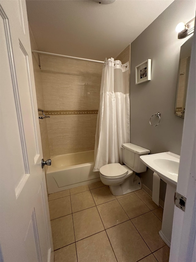 87-30 62nd Ave Unit 5-E, Rego Park, NY 11374 - full bathroom with tile patterned flooring, toilet, and shower / tub combo