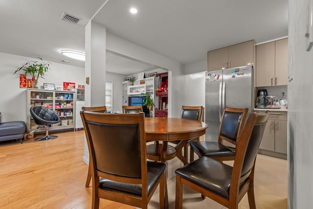 669 W Fingerboard Rd, Staten Island, NY 10305 - dining room with light wood finished floors