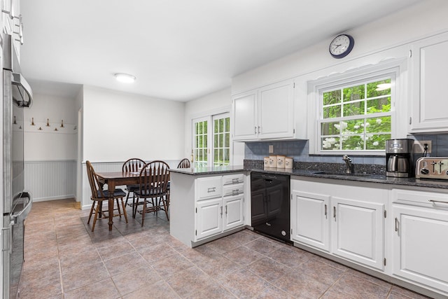 10 Catherine Pl, Katonah, NY 10536 - kitchen with dishwasher, a sink, a peninsula, white cabinets, and dark stone counters