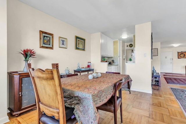 6636 Yellowstone Blvd # 6E, Forest Hills, NY 11375 - dining room featuring baseboards