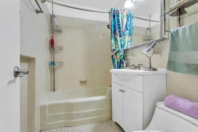 6636 Yellowstone Blvd # 6E, Forest Hills, NY 11375 - bathroom featuring shower / bath combo with shower curtain, vanity, toilet, and tile patterned flooring
