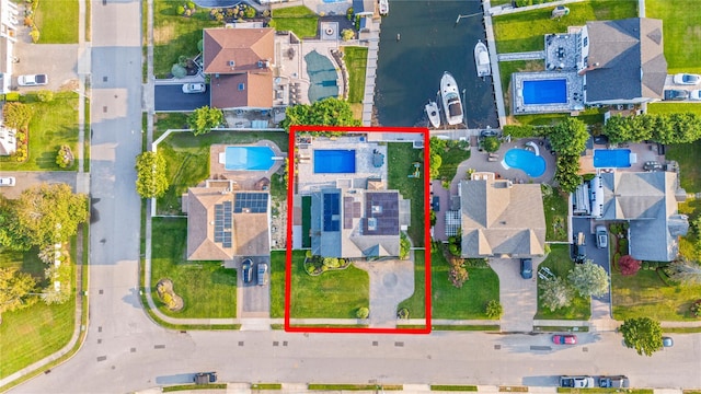 20 Skipper Dr, West Islip, NY 11795 - aerial perspective of suburban area with a pool and property parcel outlined