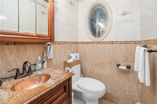 20 Skipper Dr, West Islip, NY 11795 - half bathroom featuring tile walls, toilet, and vanity